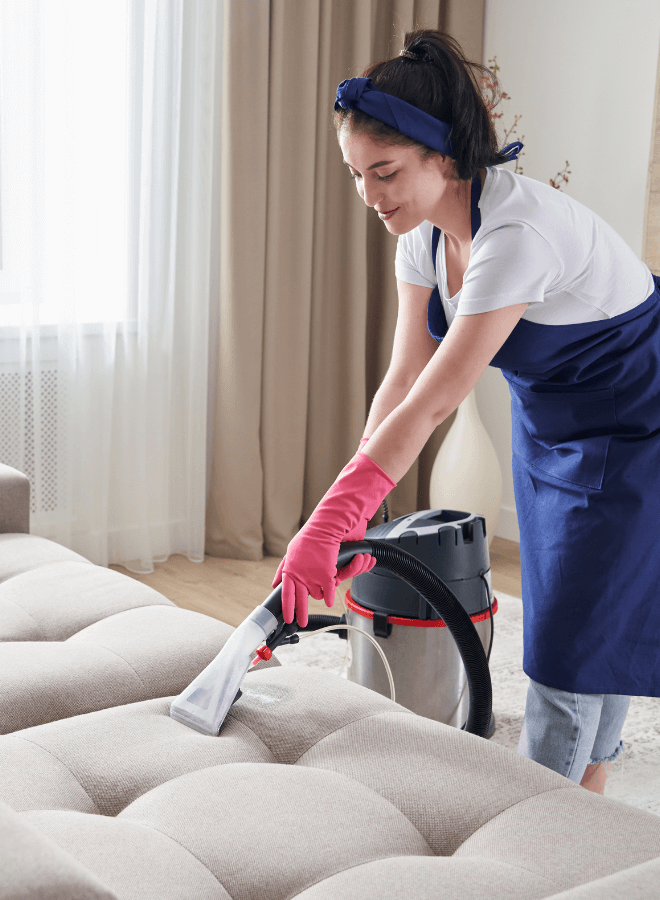 home cleaner cleaning a sofa in a bristol house